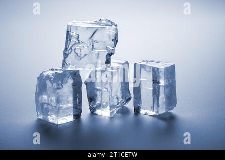 group of melted ice cubes on gray background Stock Photo