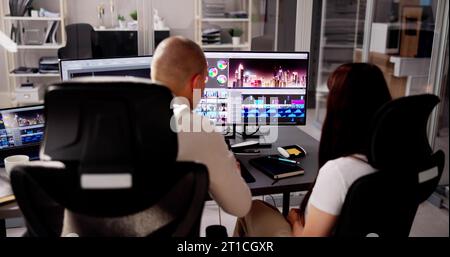 Video Editor Or Designer Using Editing Software Tech On Computer Stock Photo