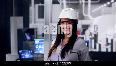 Industrial Job And Factory Worker Technician In Safety Uniform Stock Photo