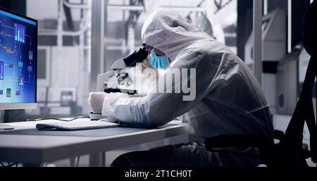 Industrial Medical Factory Research With Microscope In Production Laboratory Stock Photo