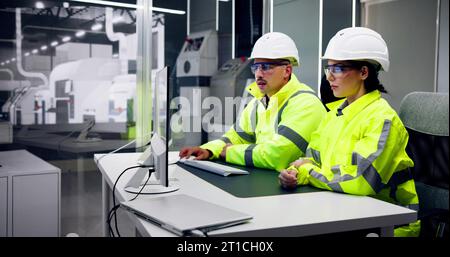 Engineer Operators Using Scada System At Industrial Plant Stock Photo