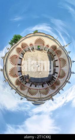 tiny planet 360 panoramic view of the Madrasa hospice of Bayezid II Mosque Complex in Edirne, Turkey. Historical Ottoman complex, it contains Dar al Stock Photo