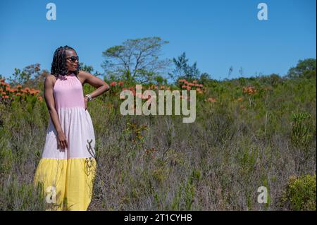 Woman seen standing in nature Stock Photo