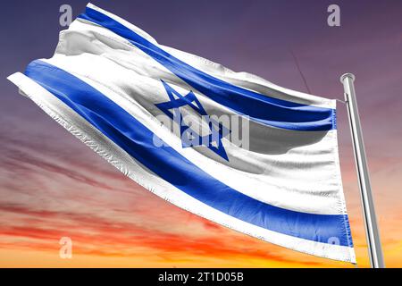 The national flag of the State of Israel .Hamas Attack: Israel Weighs Ground Invasion on Gaza Strip in Risky Strategy Stock Photo