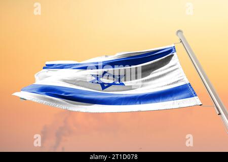 The national flag of the State of Israel .Hamas Attack: Israel Weighs Ground Invasion on Gaza Strip in Risky Strategy Stock Photo