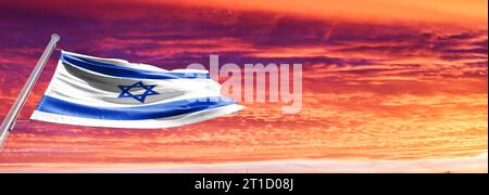 The national flag of the State of Israel .Hamas Attack: Israel Weighs Ground Invasion on Gaza Strip in Risky Strategy Stock Photo