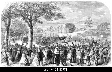 The Review of Lancashire Rifle Volunteers in Knowsley Park - from a drawing by our special artist, 1860. 'About half-past two the first regiments of volunteers came upon the scene, and took up their position on the plateau on the north side of the ground. From that time forward the various corps, some of which were loudly cheered in their progress through the crowd, arrived in rapid succession, with their respective bands playing before them. Meanwhile, the space allotted to pedestrians on the south side of the inclosure had become filled with one dense mass of human beings, yet the various av Stock Photo
