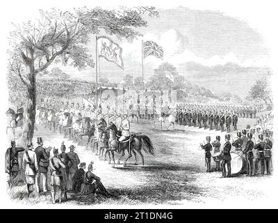 The 1st Lancashire Mounted Rifles and the Artillery Brigade marching past, 1860. Review of Lancashire Rifle Volunteers in Knowsley Park, '...commenced by the Lancashire Hussars, a magnificent body of cavalry, splendidly mounted, and numbering nearly 200 troopers. The public were loud in their encomiums on this splendid body of men and horses, whom it would be impossible to surpass by the finest regiment in the service. Next came the artillery, four battalions, and numbering upwards of 2000; and of which, if it were possible to make a distinction, the palm must be given to Colonel M'lver's thir Stock Photo