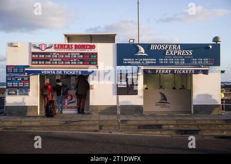 Spain, Canary Islands, Lanzarote: ticket office for the ferry to Graciosa island in Orzola Stock Photo