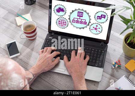 Mooc concept shown on a laptop used by a man Stock Photo