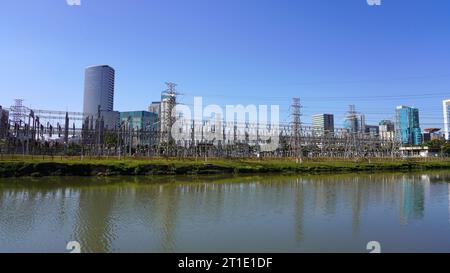 High-voltage power lines. Panoramic view of high voltage electric transmission from power plant Usina Elevatoria de Traicao on River Pinheiros in Sao Stock Photo
