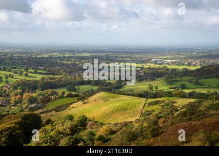 The Cheshire plain and the town of Macclesfield seen from Teggs Nose country park on a sunny day in early autumn. Stock Photo