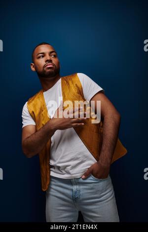 young african american man posing with one hand in pocket and one on his chest, fashion concept Stock Photo