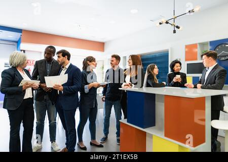 Multiracial business team working together in a boardroom of modern office - Entrepreneurship concept Stock Photo