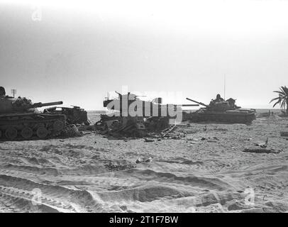 YOM KIPPUR WAR. DESTROYED ARMOUR ABANDONED ON THE WEST BANK OF THE SUEZ CANAL. Stock Photo