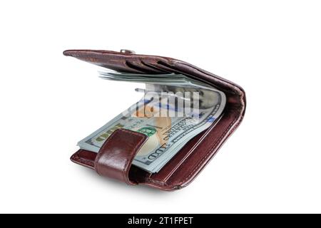 Pile of new design US dollar bills in brown wallet isolated on white background. Hundreds of dollar cash banknotes. Selective focus. Business, finance Stock Photo