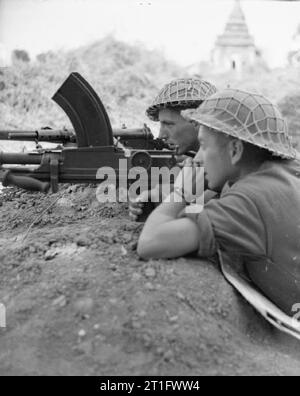 The British Army in Burma 1945 A Bren gun team in action at Ywathitgyi, February 1945. Stock Photo