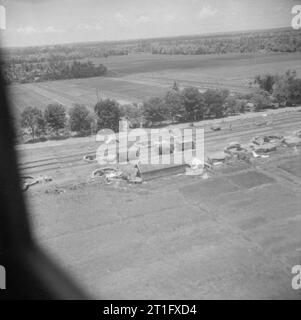 The British Occupation of Java View of the positions held by a 25 pounder field gun battery of 5th Indian Division outside the town of Surabaya (Soerabaja), taken from an Auster air observation post aircraft of 656 Squadron. Stock Photo