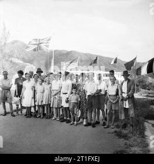 The British Reoccupation of Hong Kong Some of the first British internees to be released from Stanley Camp, Hong Kong. Stock Photo