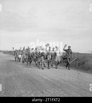 Recently released British prisoners of war march toward an airfield in ...