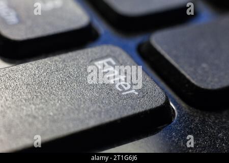 A close-up shot of an Enter key on a keyboard Stock Photo