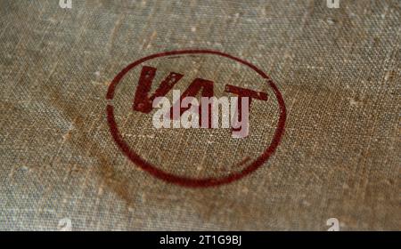 VAT stamp printed on linen sack. Value-added tax and invoice payment concept. Stock Photo