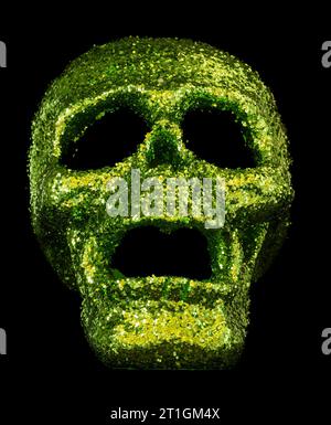 Halloween Large Green Glittered Resin Skull Decoration Stock Photo