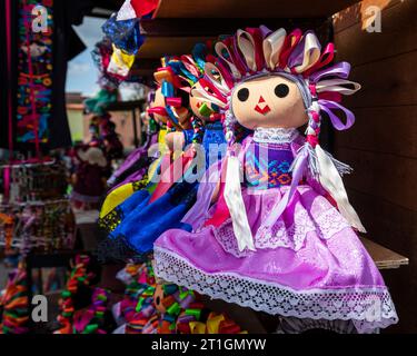 The town of Amealco, Mexico is known for these colorful rag dolls crafted by the indigenous Otomi known as "Marías." Stock Photo