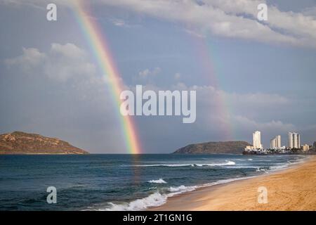 A double rainbow over the Pacific Ocean in Mazatlan, Sinaloa, Mexico. Stock Photo