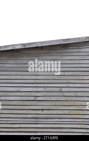 Old aged weathered natural grey damaged wooden farm shack wall texture, large detailed textured isolated rustic grungy vertical background closeup Stock Photo