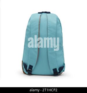 close up trendy fashionable school backpack blue color isolated on white background with clipping path. back view shoulder strap bag. Stock Photo