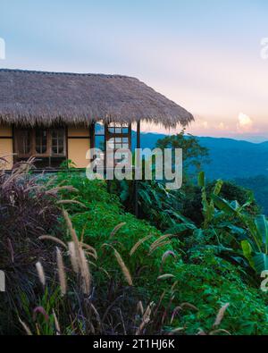 Homestay in the Doi Chang mountains of Chiang Rai Northern Thailand, bamboo wooden hut in the mountains, cottage cabin at sunset in the mountains of Northern Thailand Stock Photo