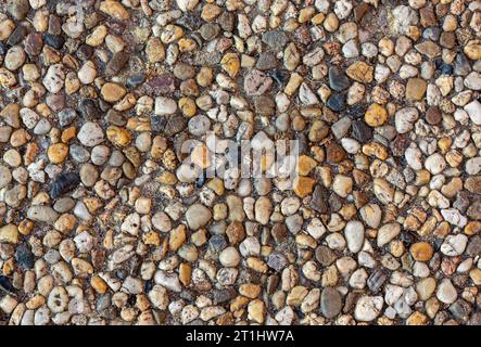 small brown pebbles background texture close-up Stock Photo
