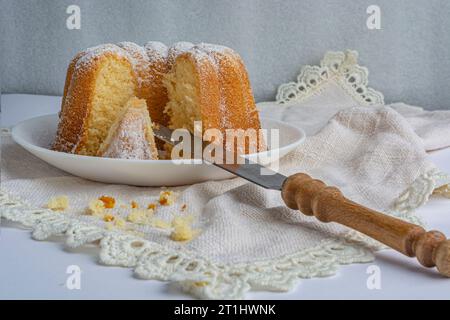 cupcake in powdered sugar on a white napkin close-up Stock Photo
