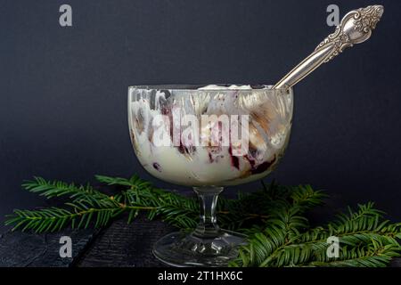 New Year's dessert in a cup on a dark background Stock Photo