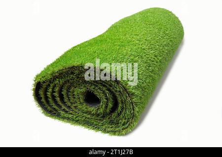 Close up of roll of artificial grass isolated on white background. Stock Photo