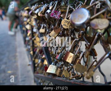 Paris, France, 17.09.2023 padlocks on fence near the Basilica of the Sacred Heart of Paris Stock Photo