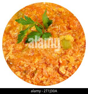 One of the most eaten dishes of Turkish cuisine is menemen, isolated on white background Stock Photo