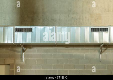 Equipment for ventilation and ceiling insulation systems in the factory lot in the basement of a modern building Stock Photo