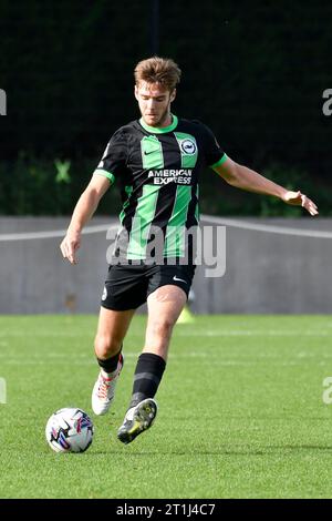 Ruairi McConville of Brighton & Hove Albion warms up before the ...