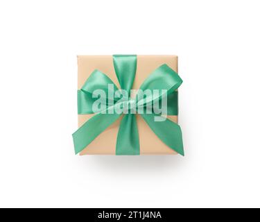 Top view of peach color present box with emerald ribbon isolated on white background Stock Photo