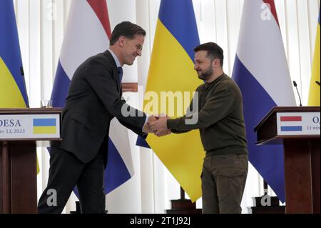 Non Exclusive: ODESA, UKRAINE - OCTOBER 13, 2023 - Ukrainian President Volodymyr Zelenskyy (R) and Dutch Prime Minister Mark Rutte shake hands during Stock Photo