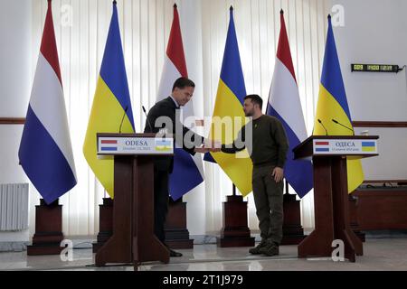 Non Exclusive: ODESA, UKRAINE - OCTOBER 13, 2023 - Ukrainian President Volodymyr Zelenskyy (R) and Dutch Prime Minister Mark Rutte shake hands during Stock Photo