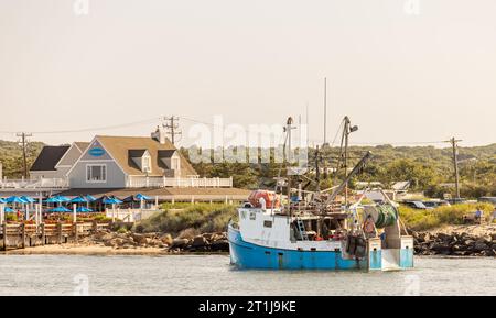 Commerical fishing vessel, tomahawk returning to dock in montauk, ny Stock Photo