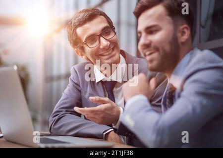 two young programmers working together in the office Stock Photo