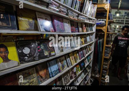 Bantul, Yogyakarta, Indonesia. 14th Oct, 2023. Physical album recordings in Compact Disc (CD) format are displayed in a music shop called Toko Musik Luwes in Bantul. According to data released by the Recording Industry Association of America (RIAA), music revenues are increasing, driven primarily by streaming services but also by sales of physical music formats. The report found that revenues from physical music formats have gradually increased over the years. Overall physical music revenue rose 4 percent last year, driven by a 17 percent increase in vinyl records. Physical releases of music Stock Photo