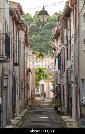 Houses with shuttered windows in the town of Quillan, Aude. Stock Photo