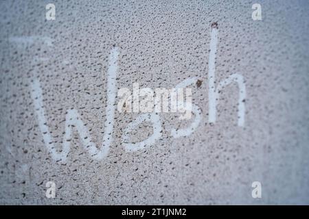 Dirty and mud stain on white car surface Stock Photo
