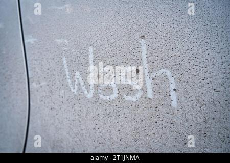 Dirty and mud stain on white car surface Stock Photo