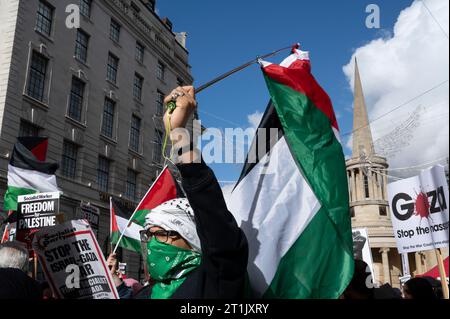 On October 14th 2023  thousands of people marched through Central London to demand an end to the bombing in Gaza. Stock Photo